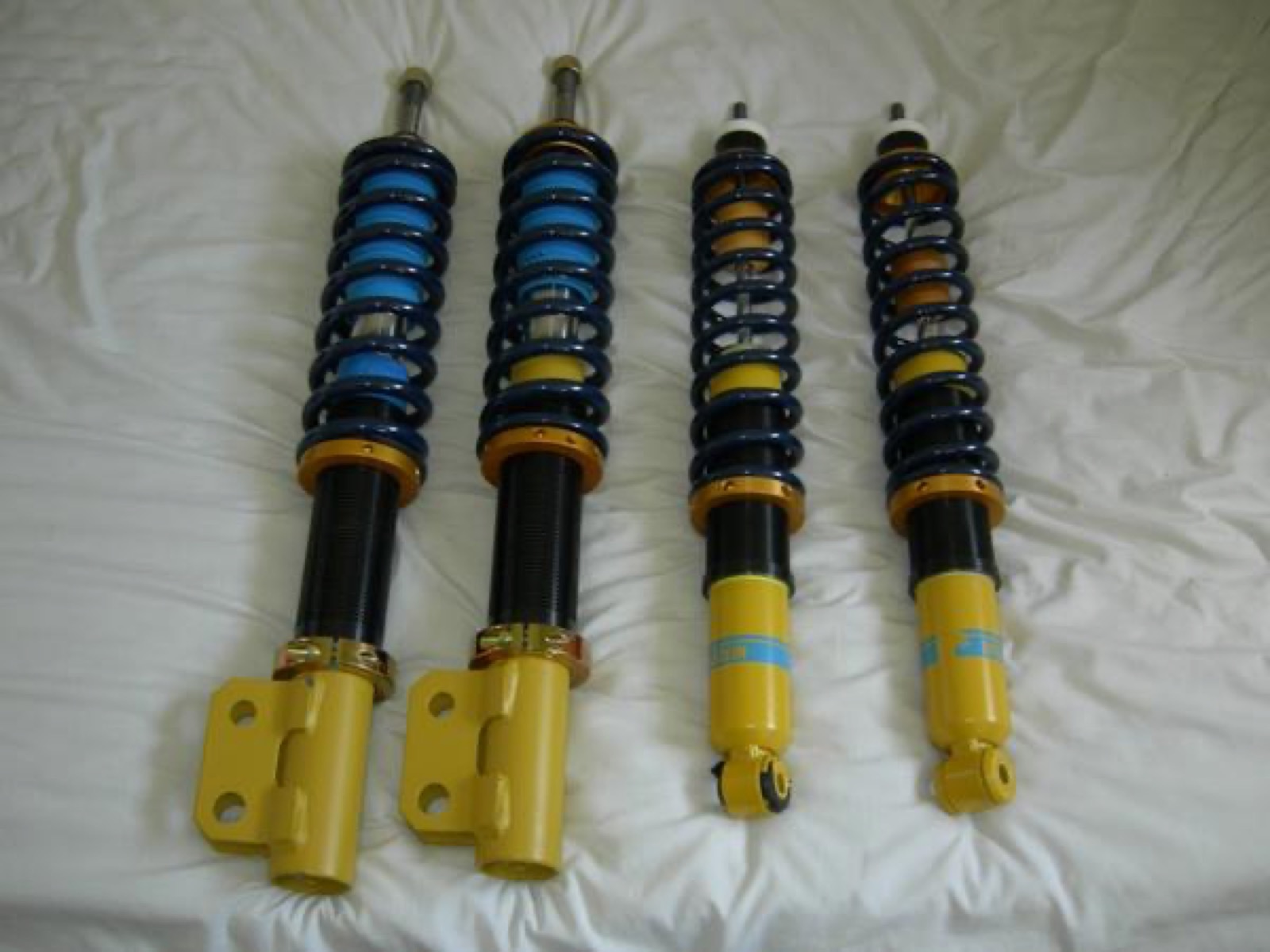 An aftermarket coilover assembly, the same family of components that sits inside a CDC or MRC damper in a modern factory-built car. China's CDC supply chain, led by the major OEM damper suppliers, has brought this kind of continuously variable hardware from the aftermarket into the showroom. (Image: Wikimedia Commons, CC BY 2.0, Cameron Chapman)