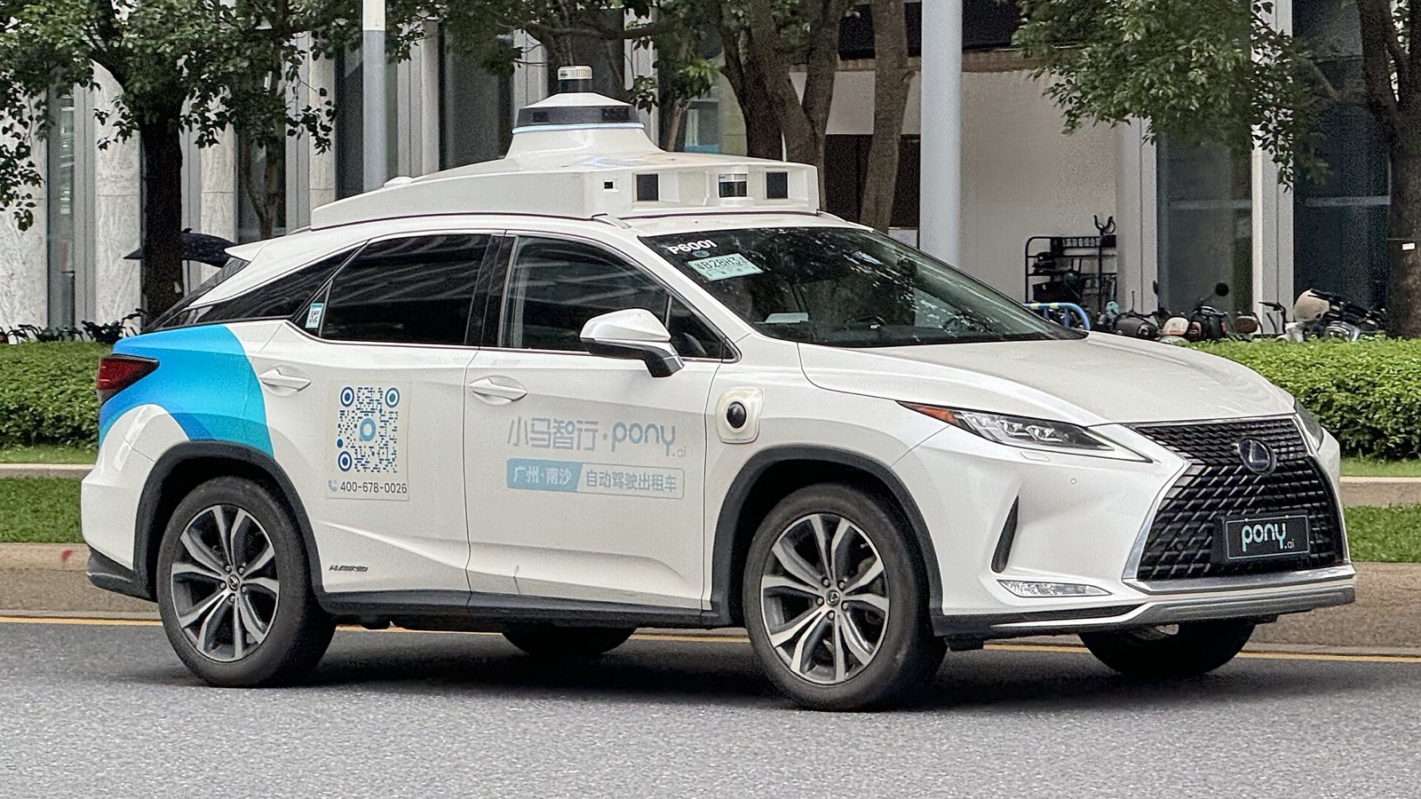 A Pony.ai robotaxi (Lexus RX450h with roof-mounted lidar) on a Guangzhou street, one of the visible public deployments of China's autonomous-driving ecosystem — the same market where Horizon Robotics' HSD is now competing, and one of the most demanding proving grounds for a one-stage end-to-end driving stack. (Image: Wikimedia Commons, CC BY 2.0, S5A-0043)