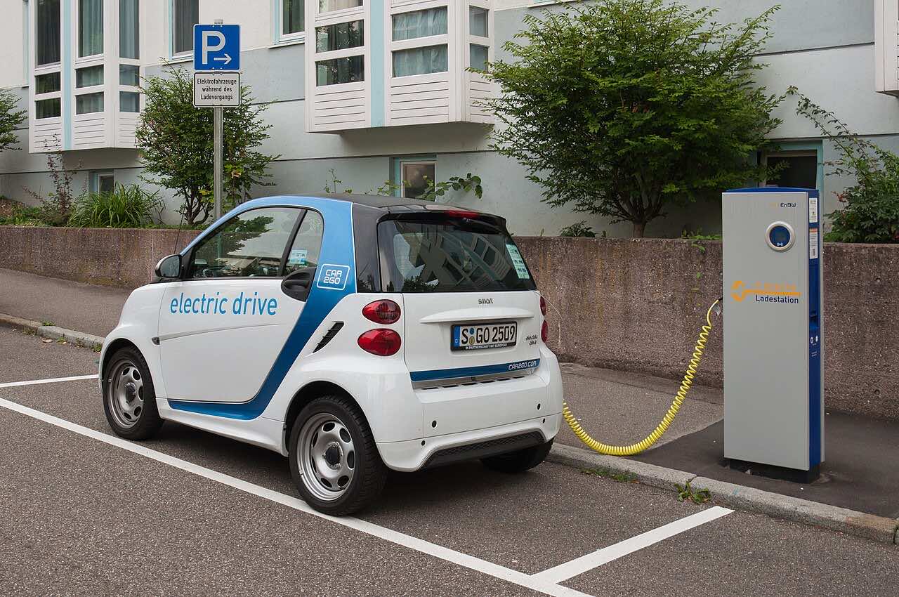 A public EV charging station in Stuttgart, Germany — the kind of AC wallbox that bidirectional V2G-capable cars can now feed energy back through under the 2026 regulatory framework.